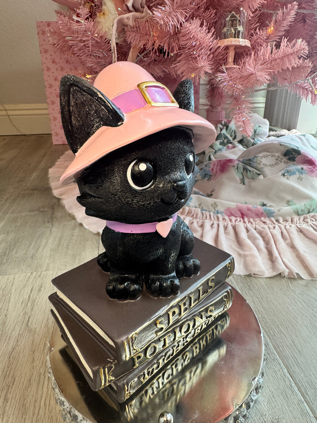 Halloween pink kitty on spell book