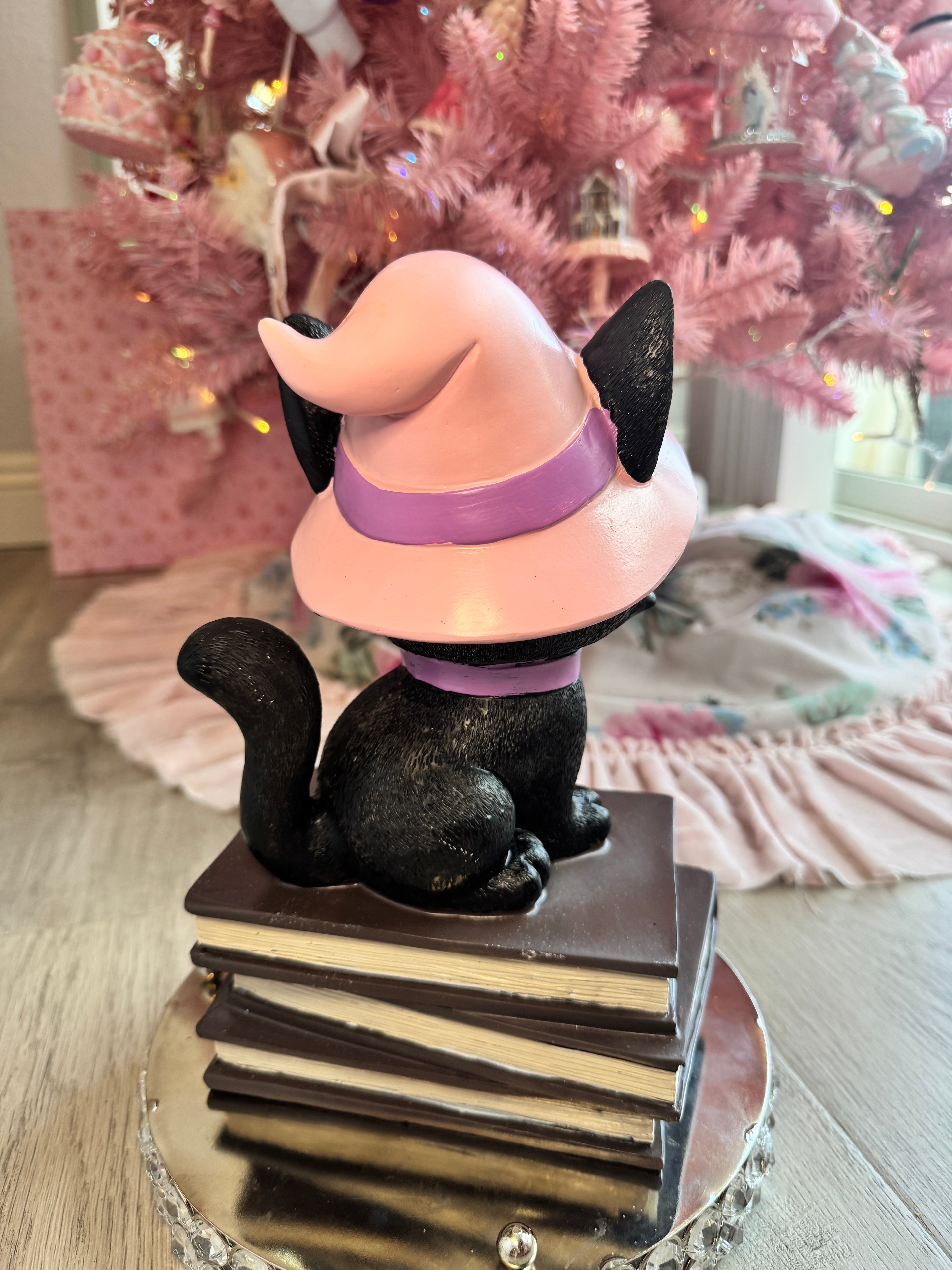 Halloween pink kitty on spell book