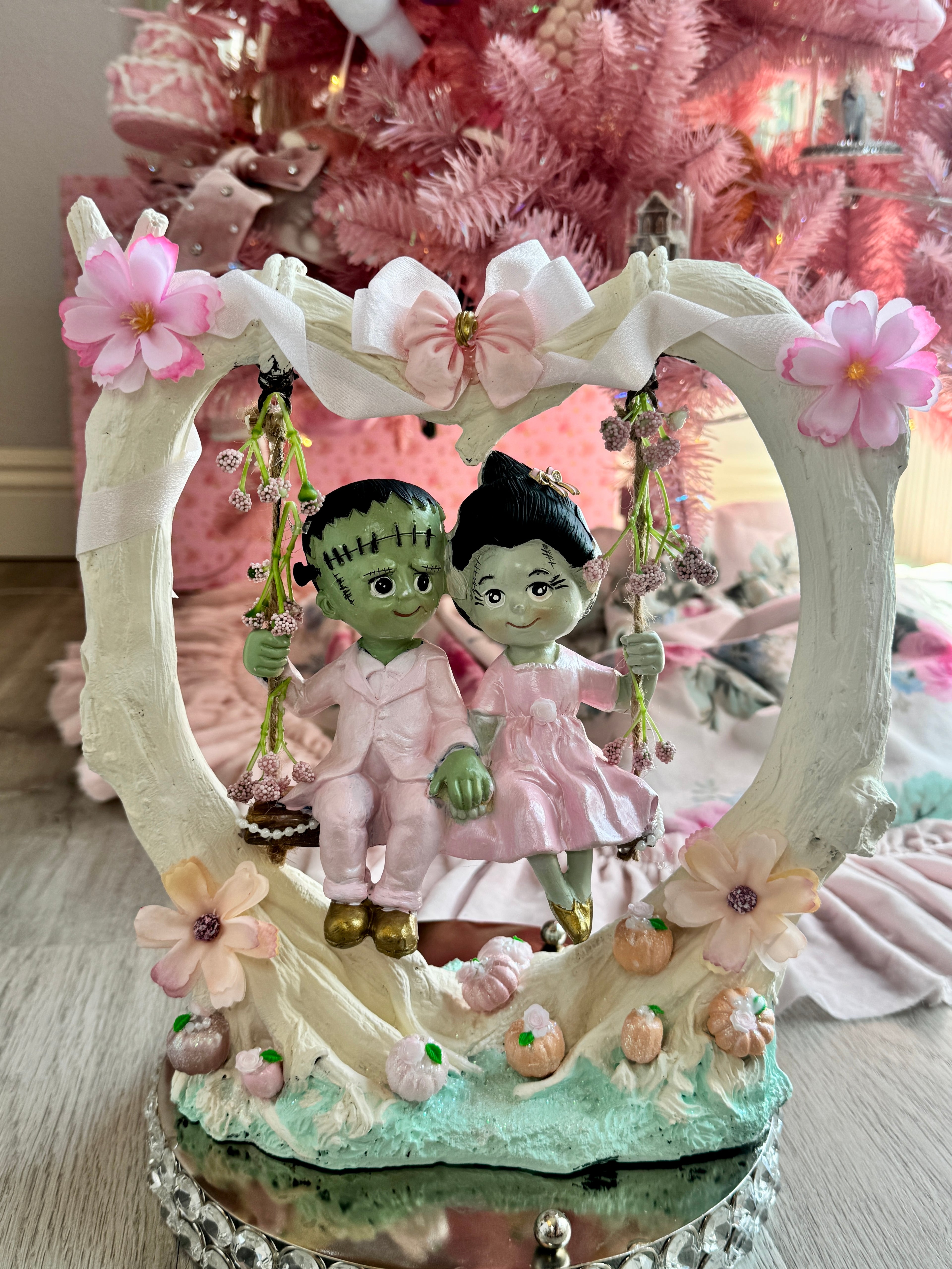 Frankenstein and Bride on swing