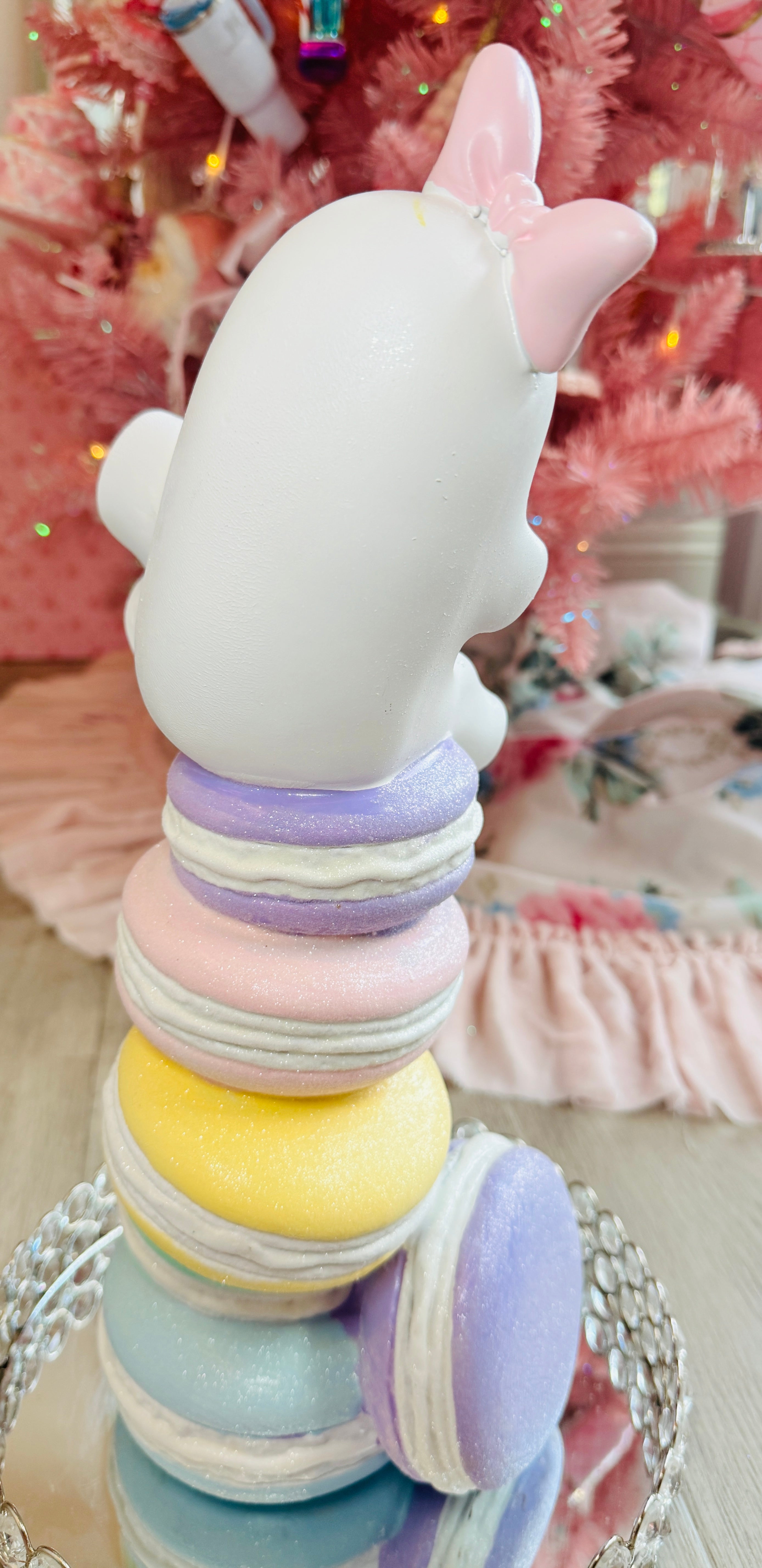 Halloween ghost on multicolor macarons