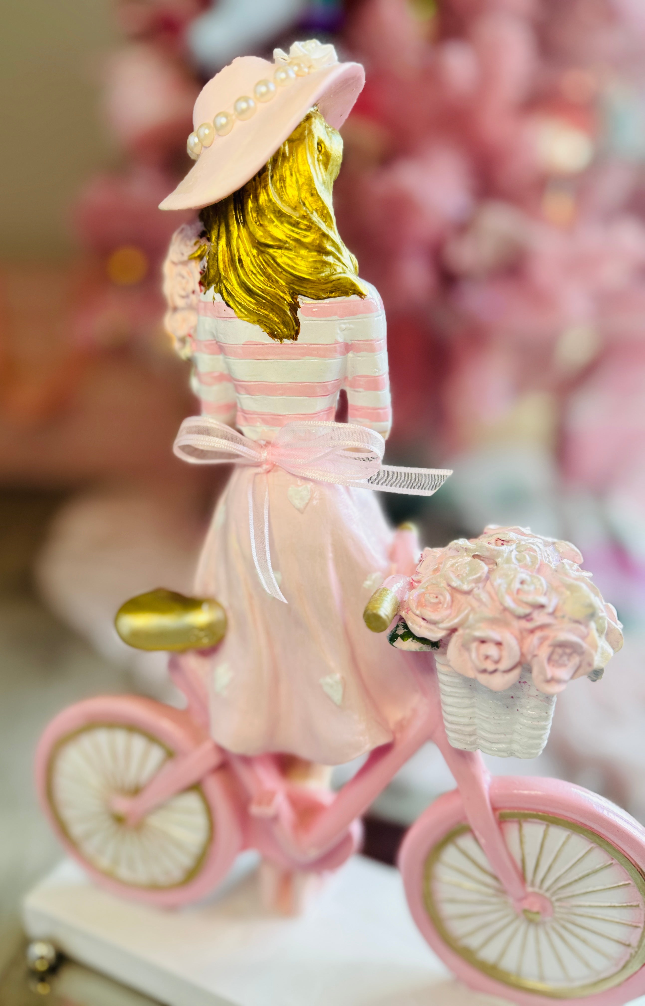 Girl with  Hat On Bicycle