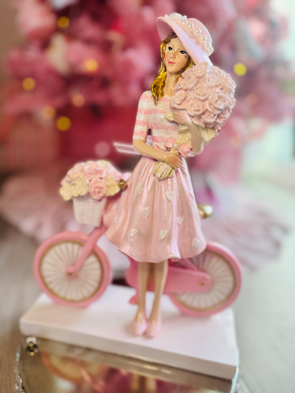 Girl with  Hat On Bicycle
