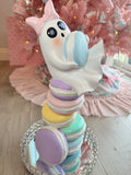Halloween ghost on multicolor macarons