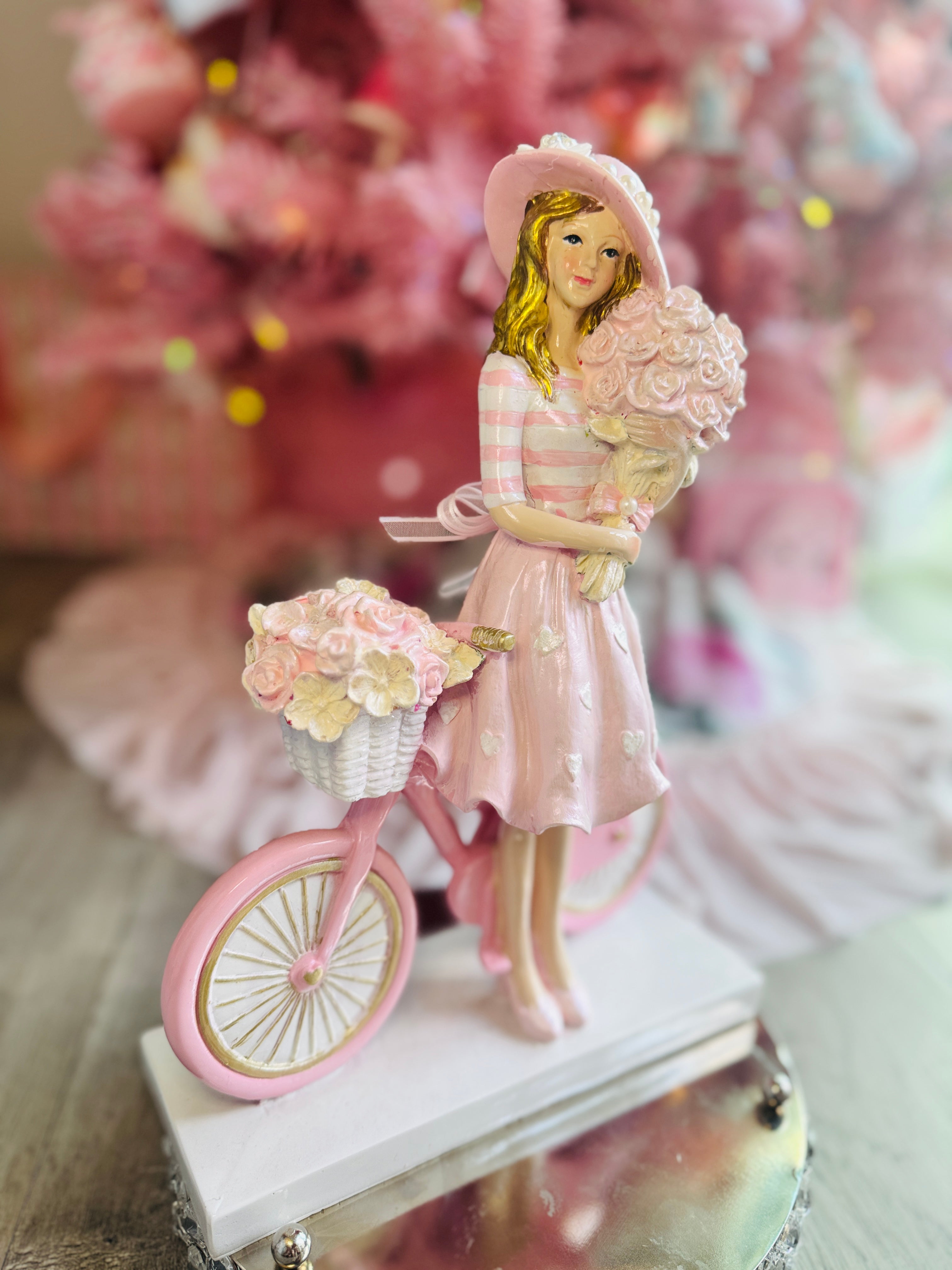 Girl with  Hat On Bicycle