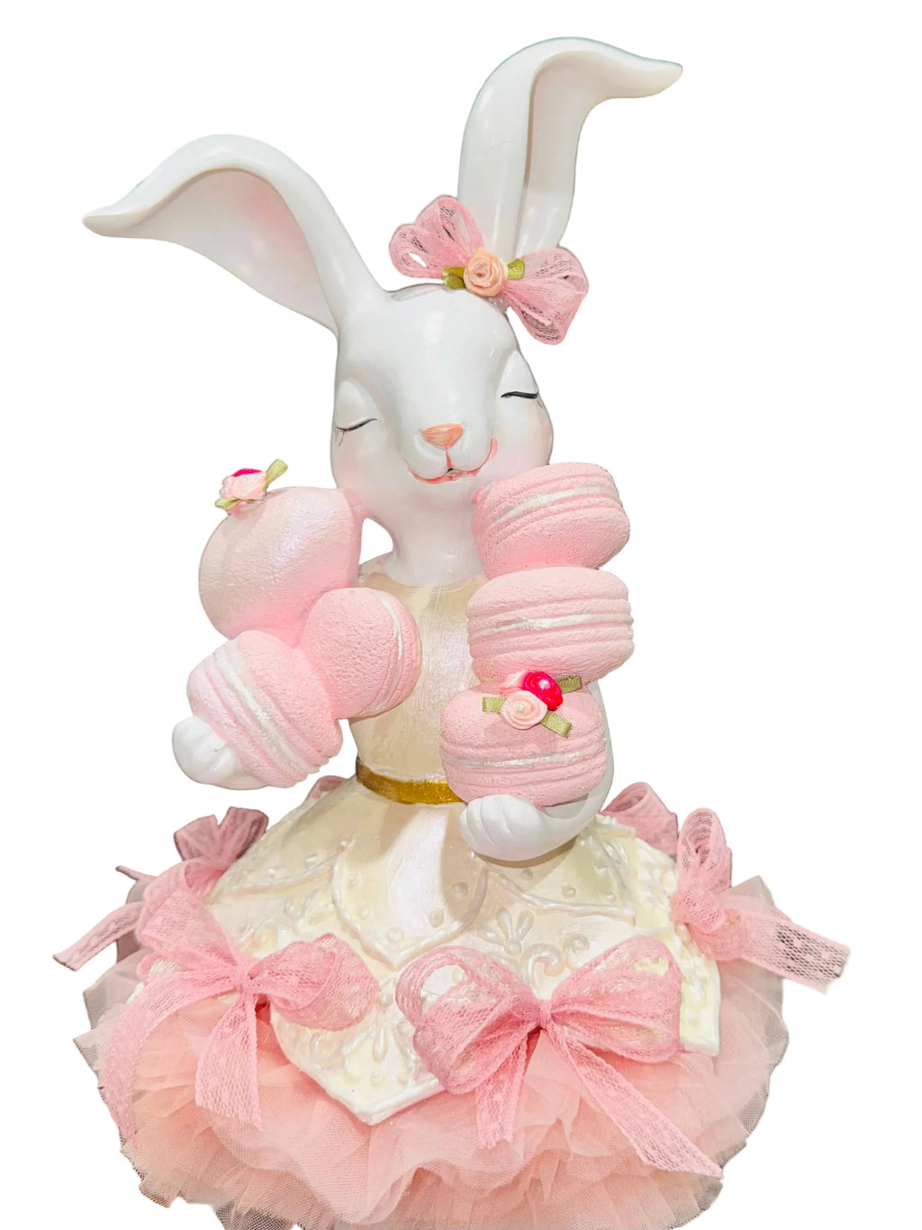 Pink Easter Bunny Girl figurine holding macaron