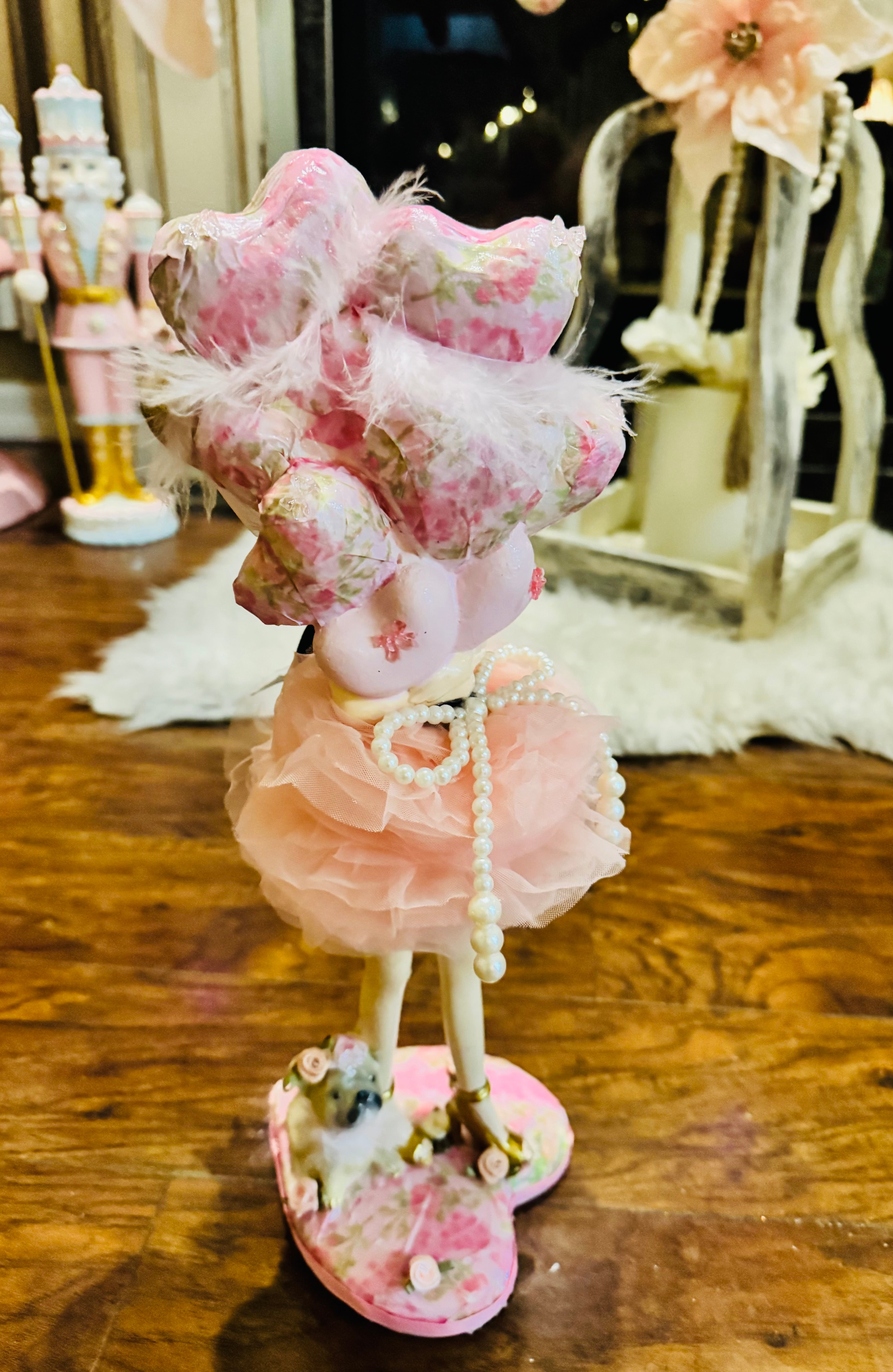 Pink Girl Holding Balloons figurine