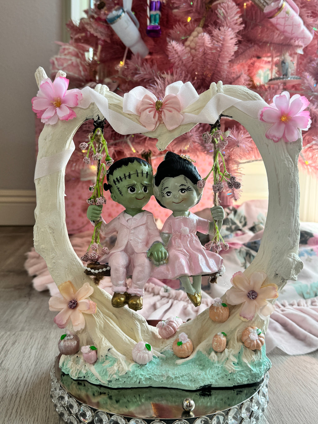 Frankenstein and Bride on swing
