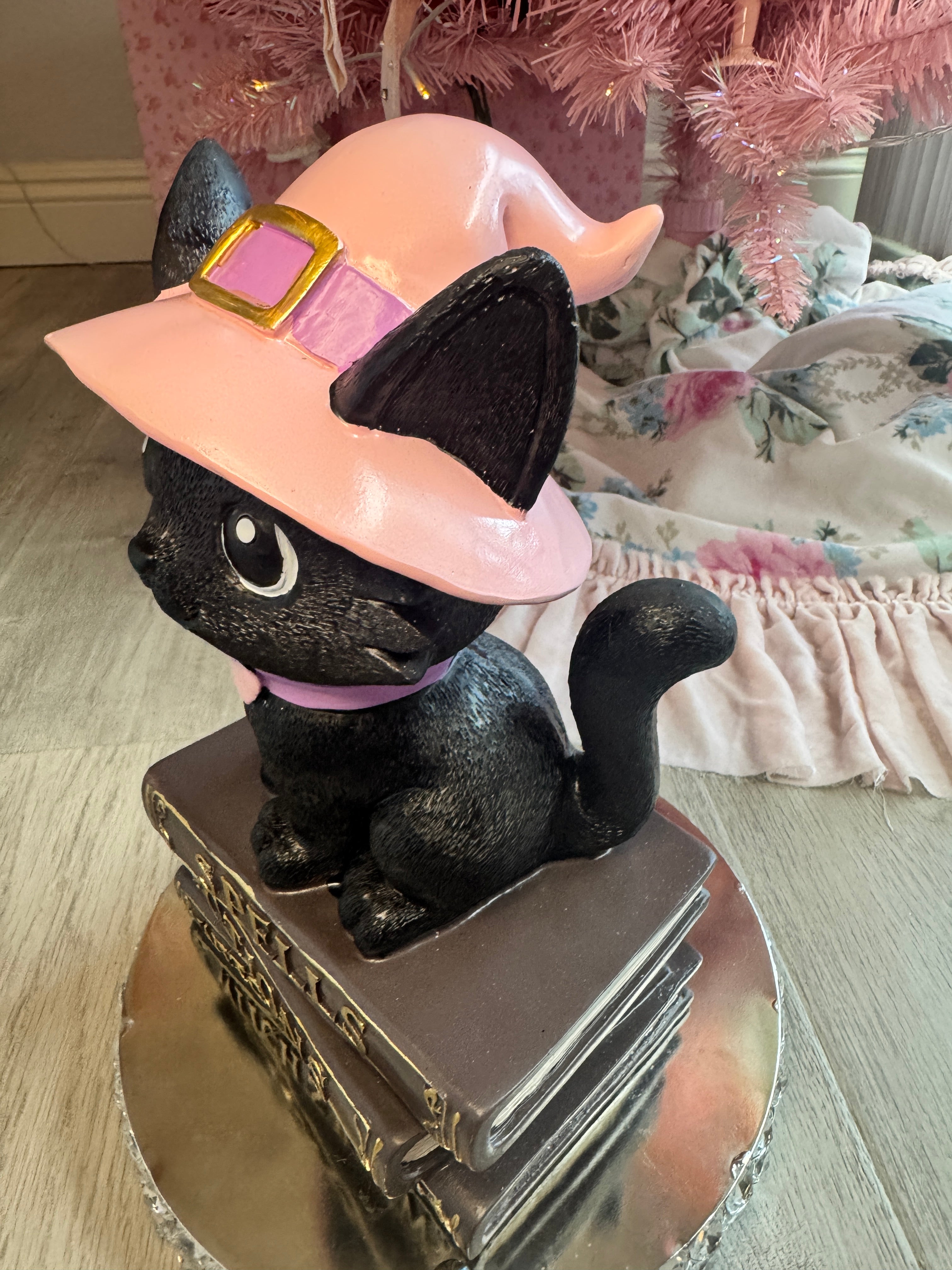 Halloween pink kitty on spell book