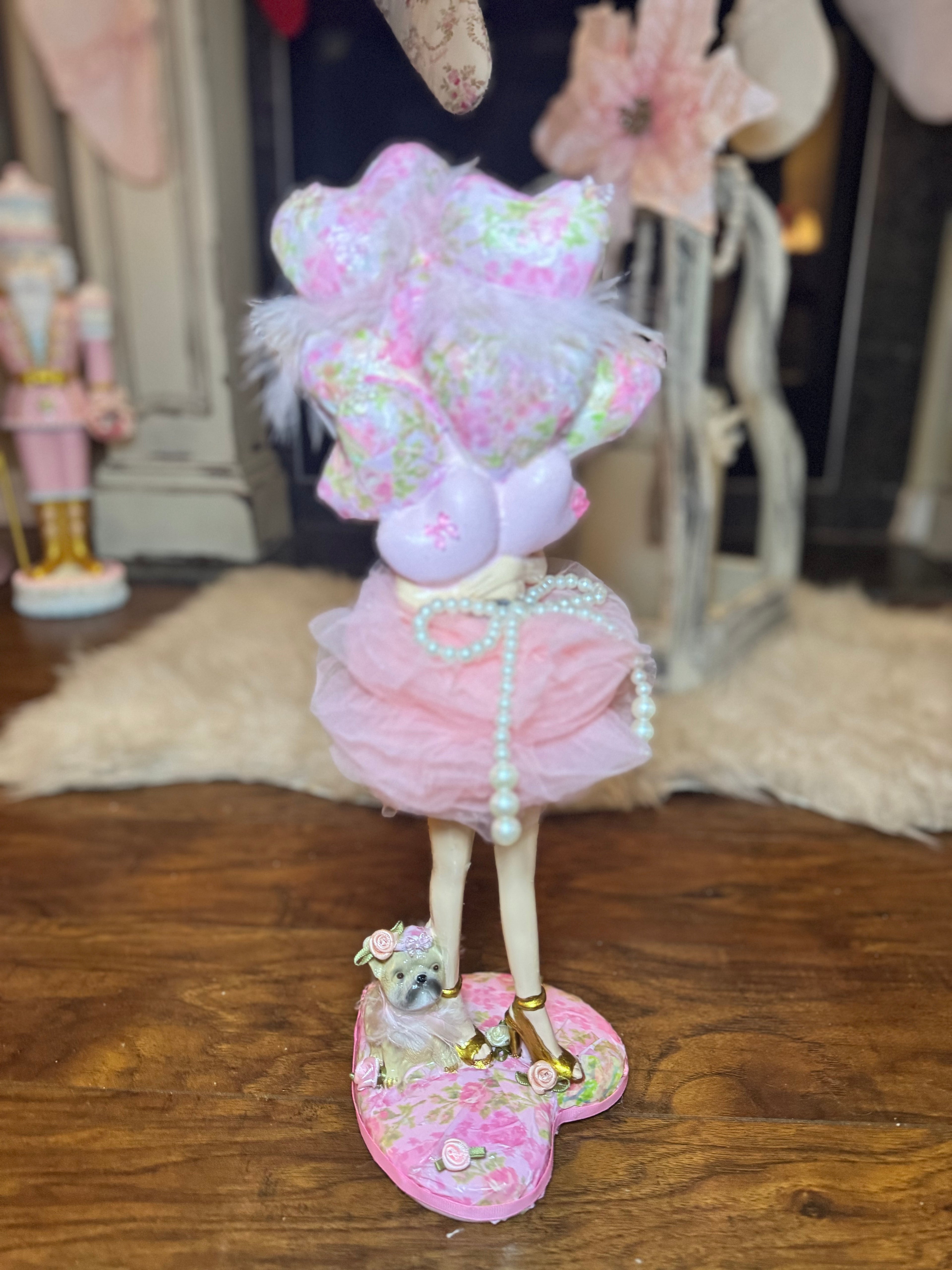 Pink Girl Holding Balloons figurine