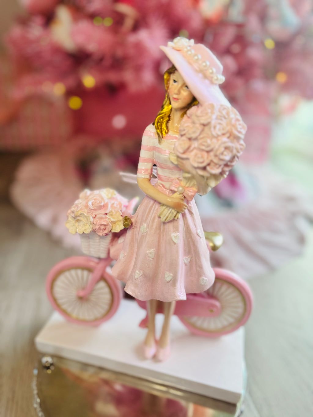 Girl with  Hat On Bicycle