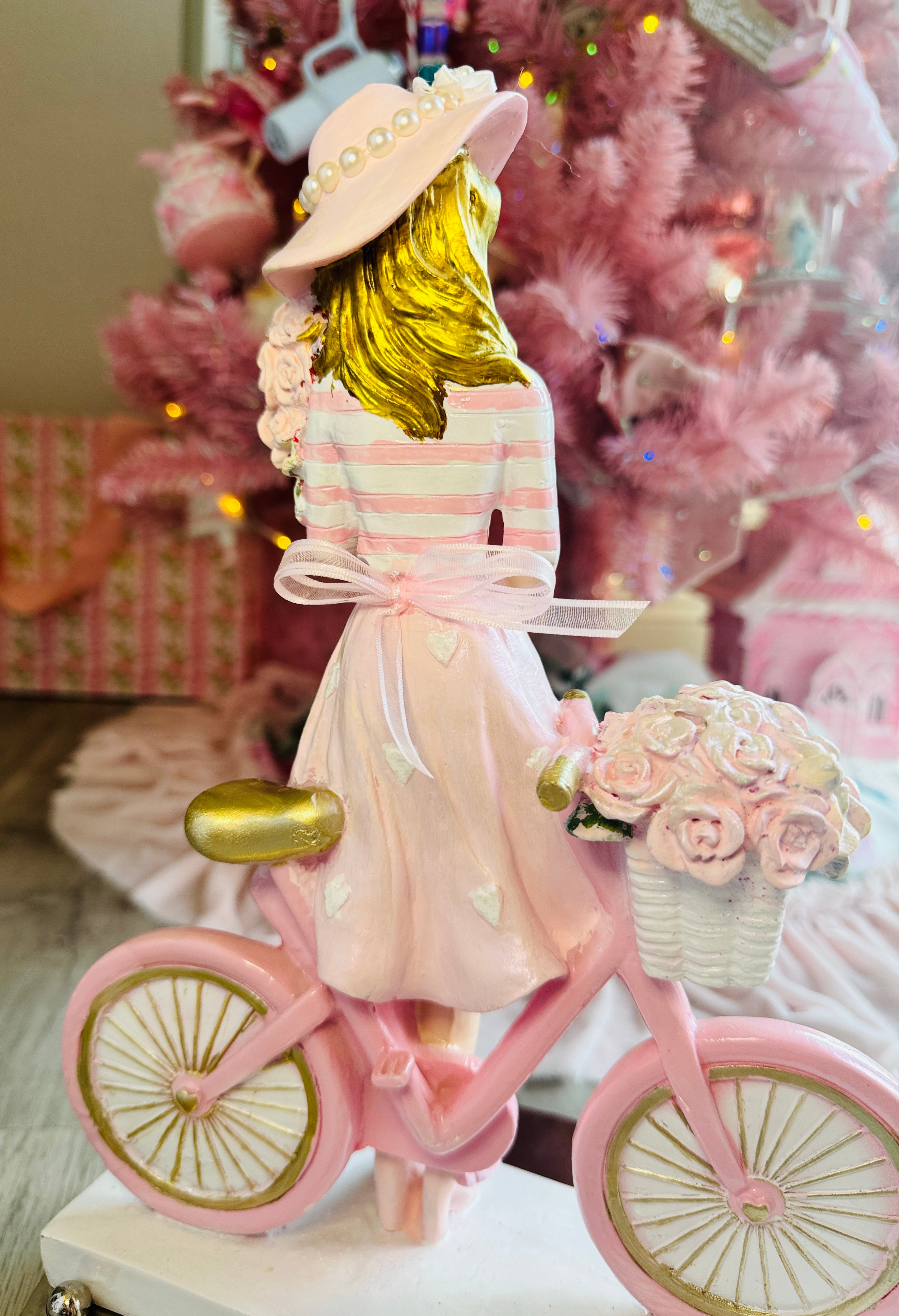 Girl with  Hat On Bicycle