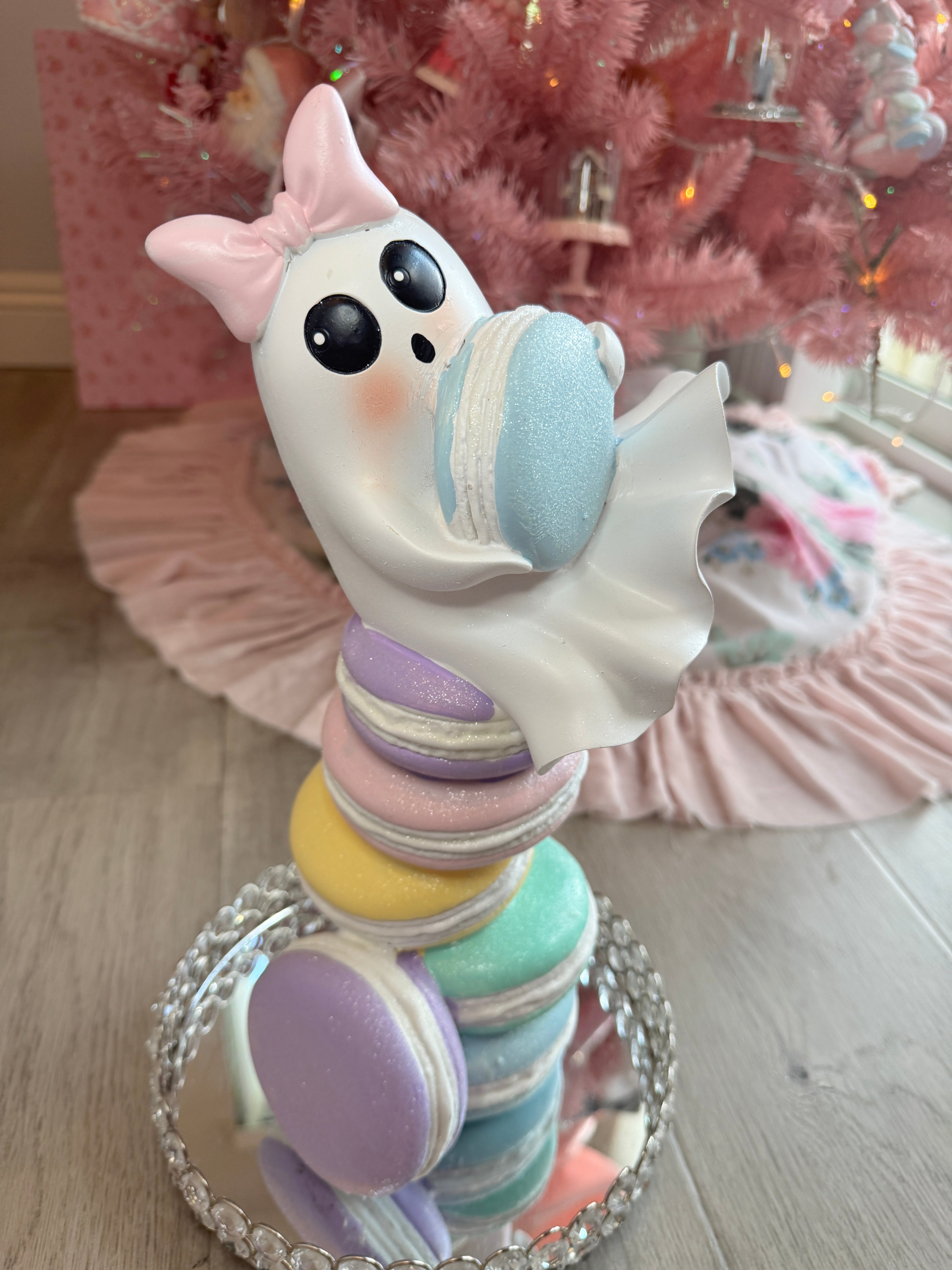 Halloween ghost on multicolor macarons