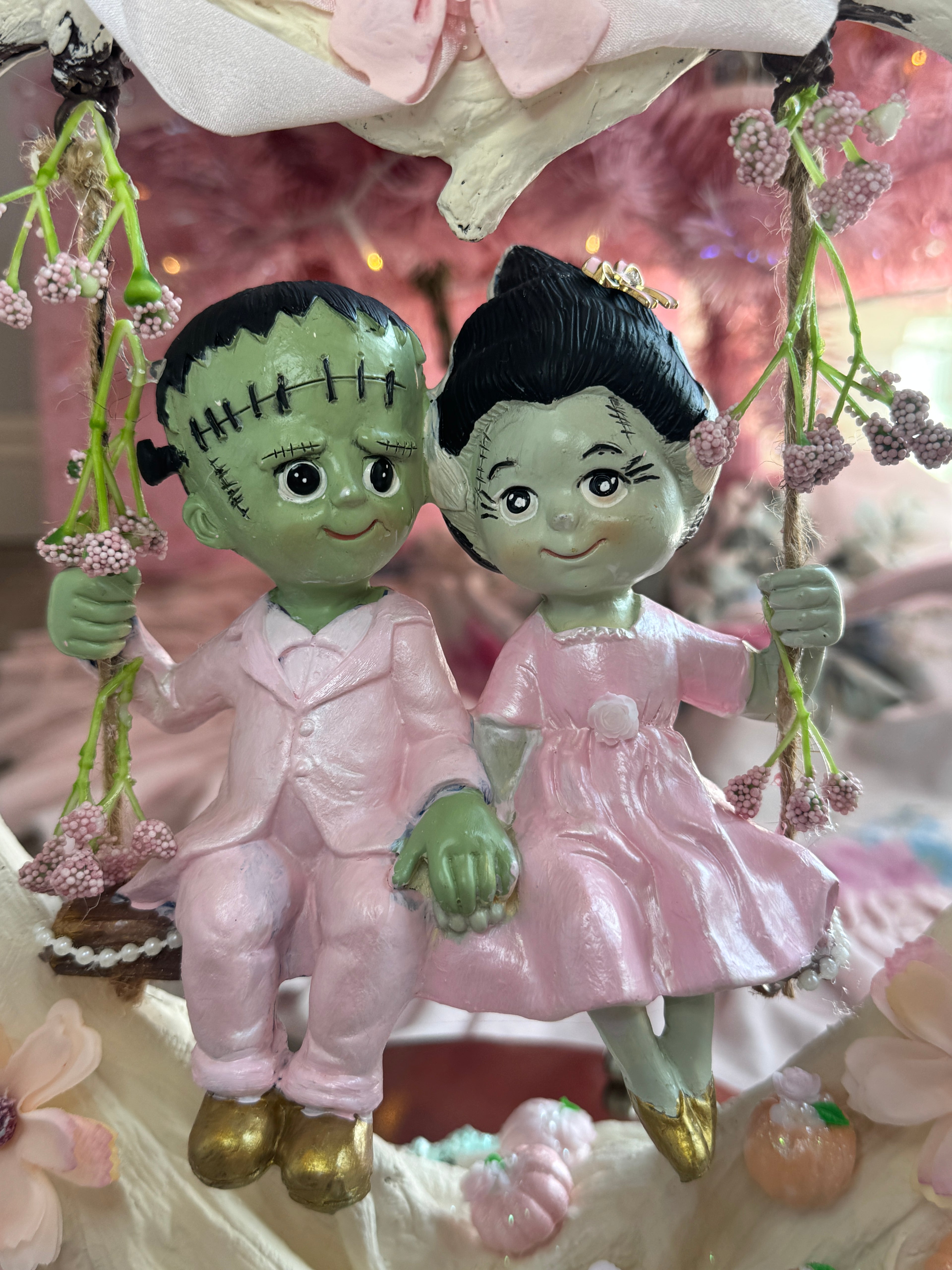 Frankenstein and Bride on swing