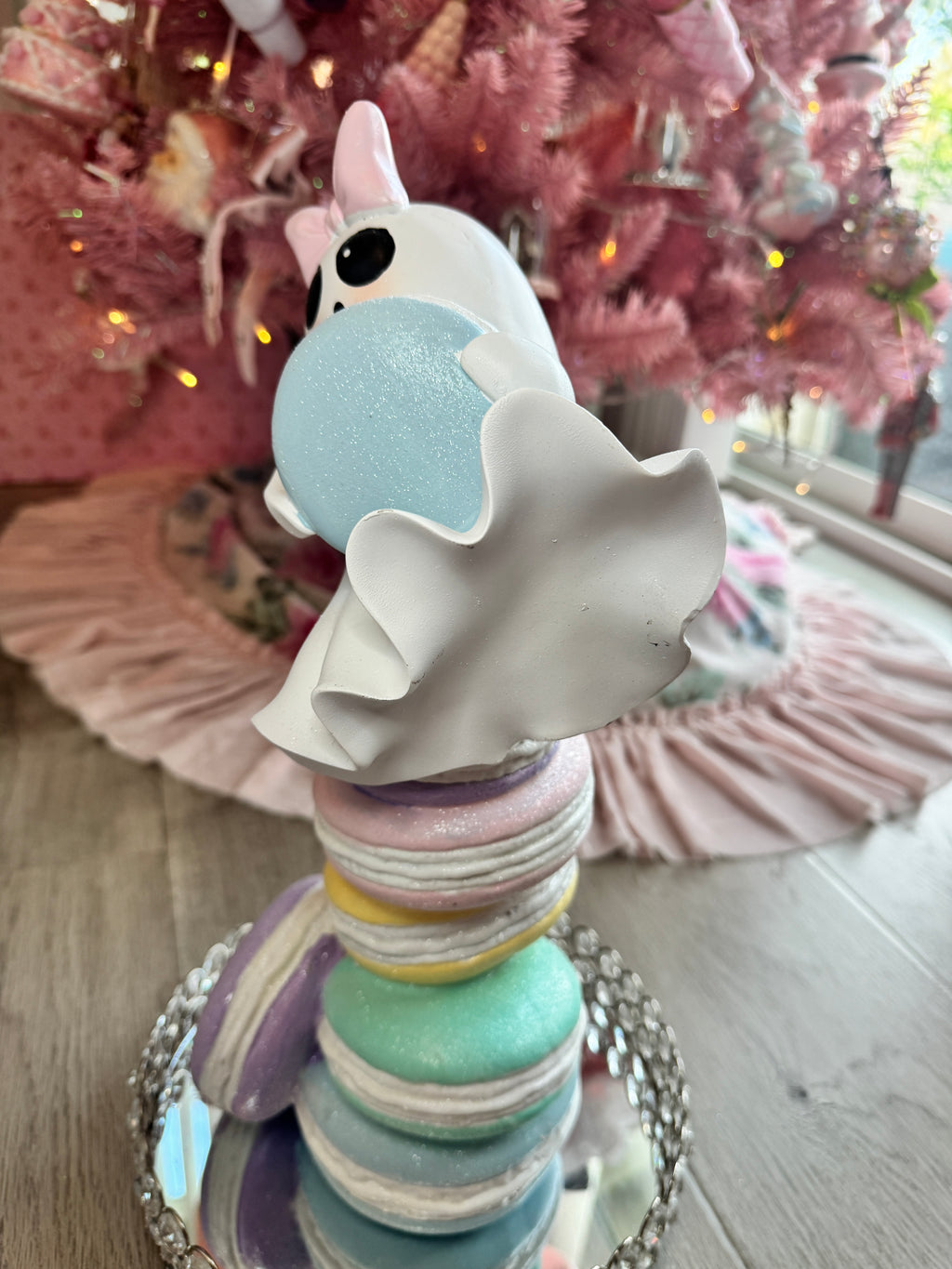 Halloween ghost on multicolor macarons