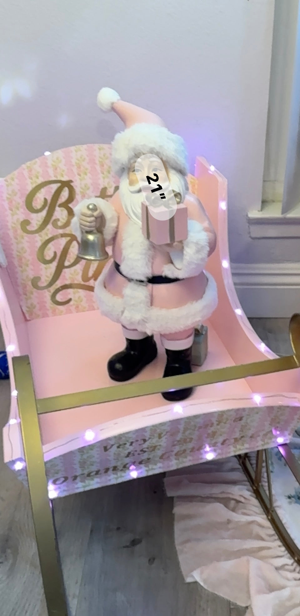 Pink Santa with gifts and bell