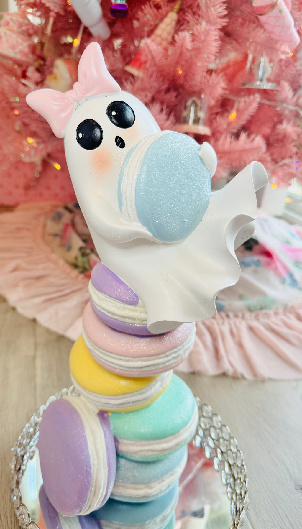 Halloween ghost on multicolor macarons