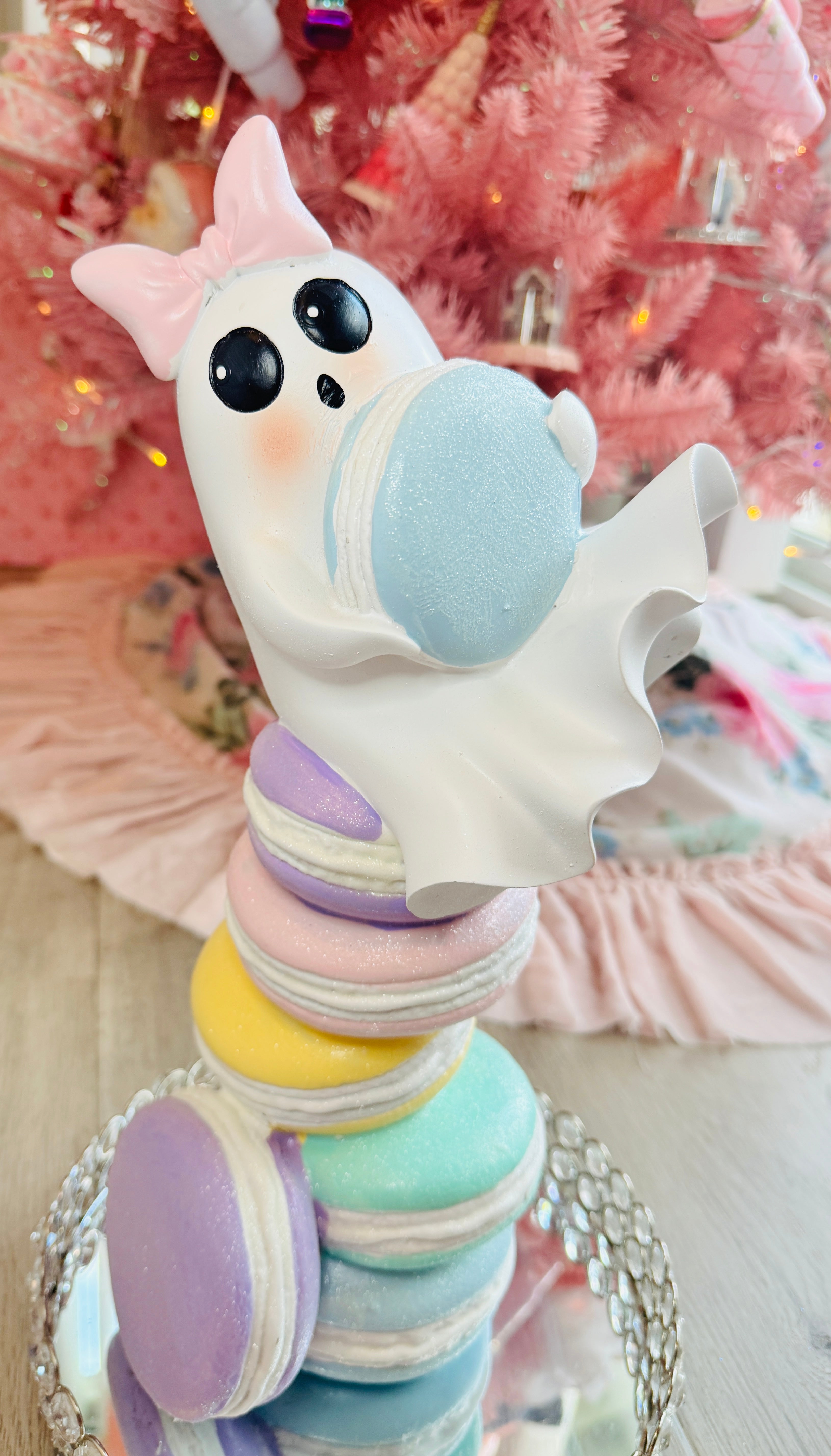 Halloween ghost on multicolor macarons