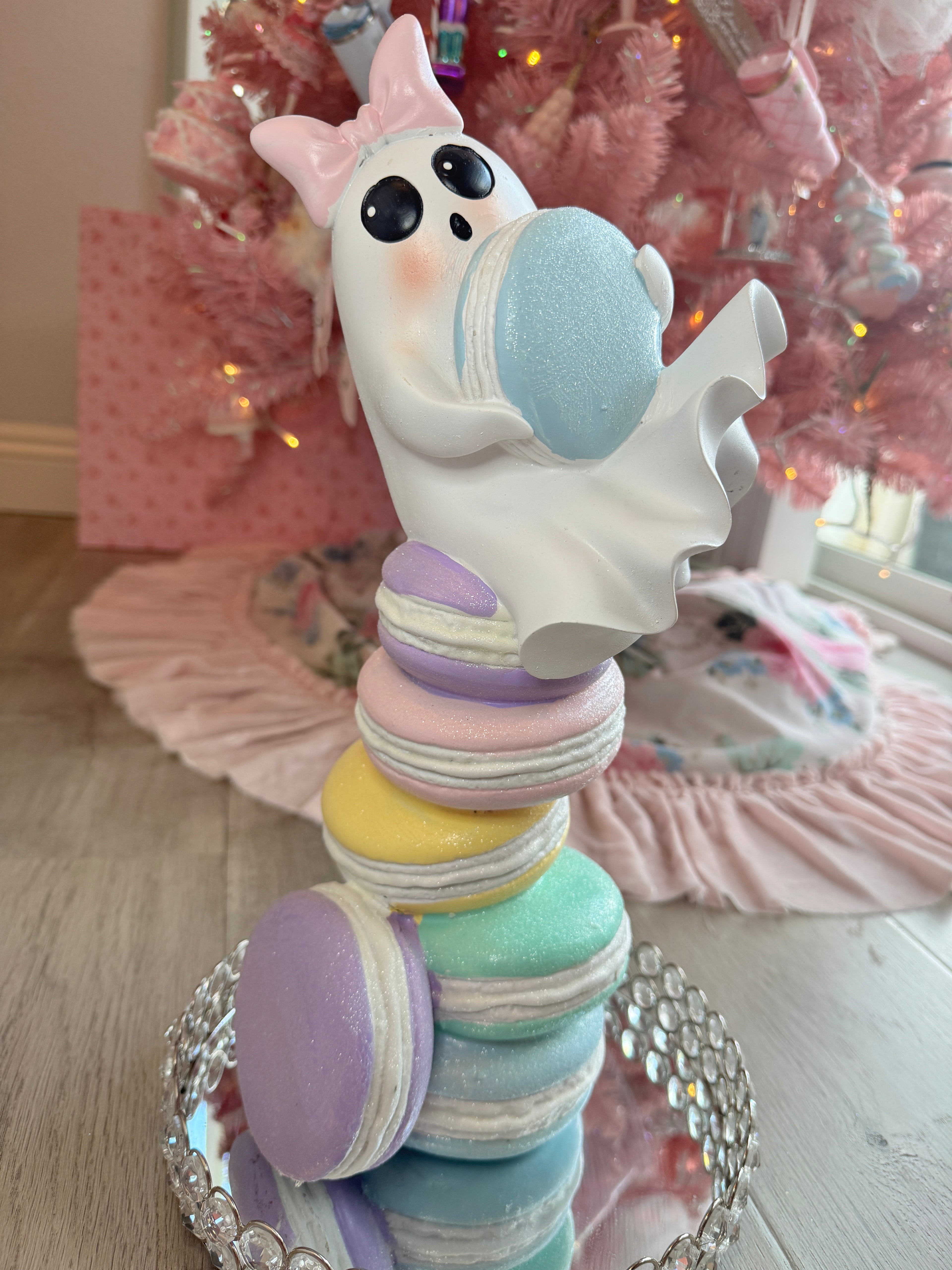 Halloween ghost on multicolor macarons