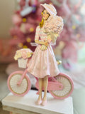Girl with  Hat On Bicycle