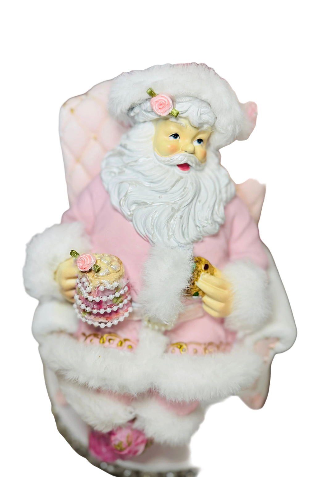 Pink Santa with on recliner figurine