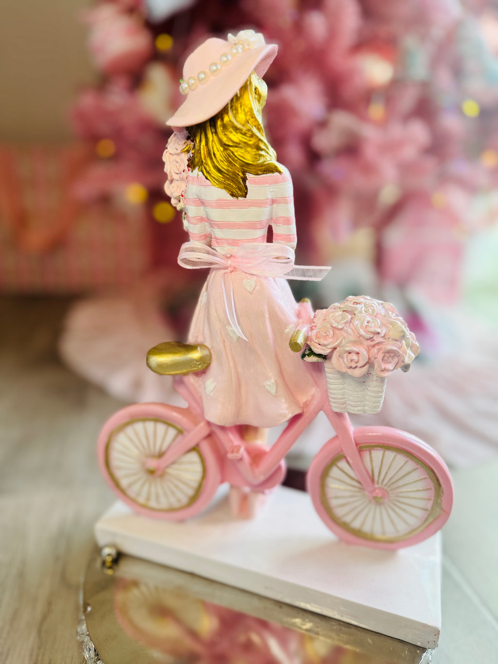 Girl with  Hat On Bicycle