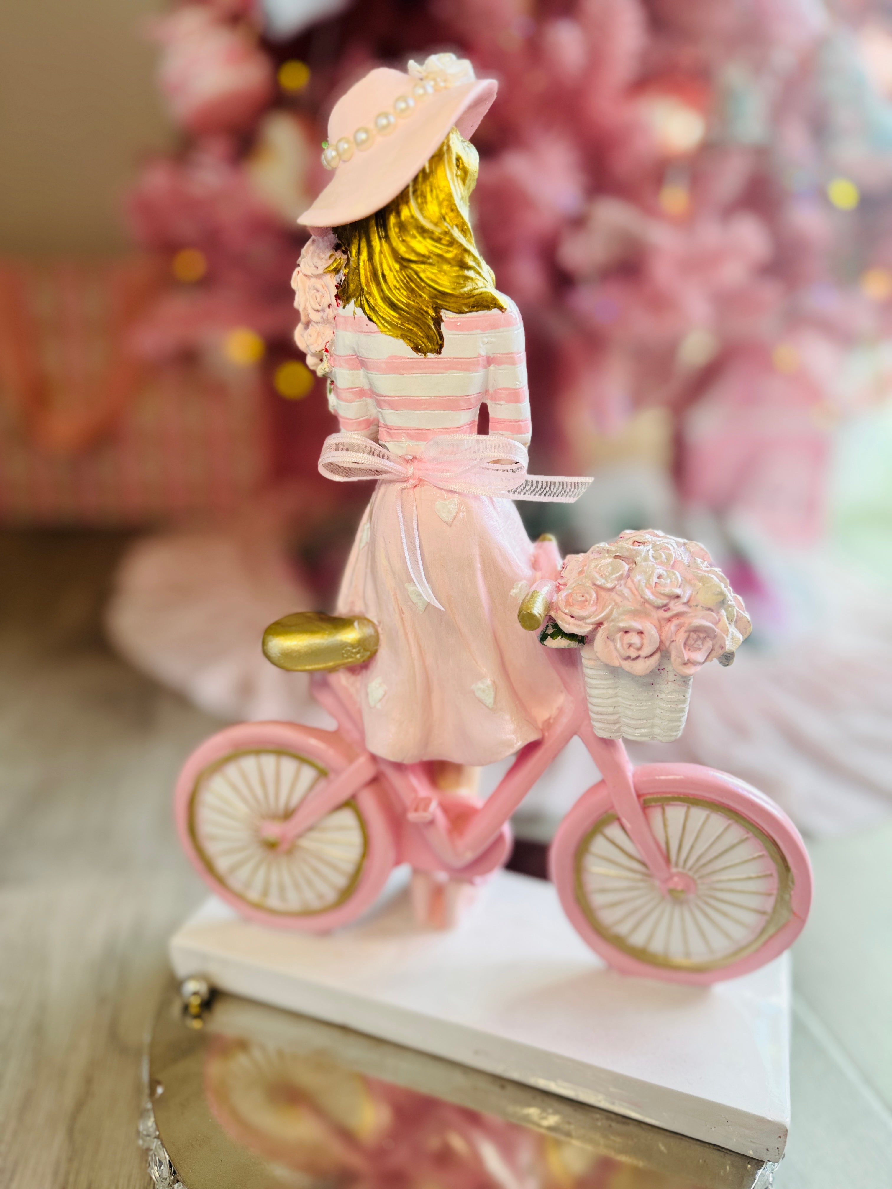 Girl with  Hat On Bicycle