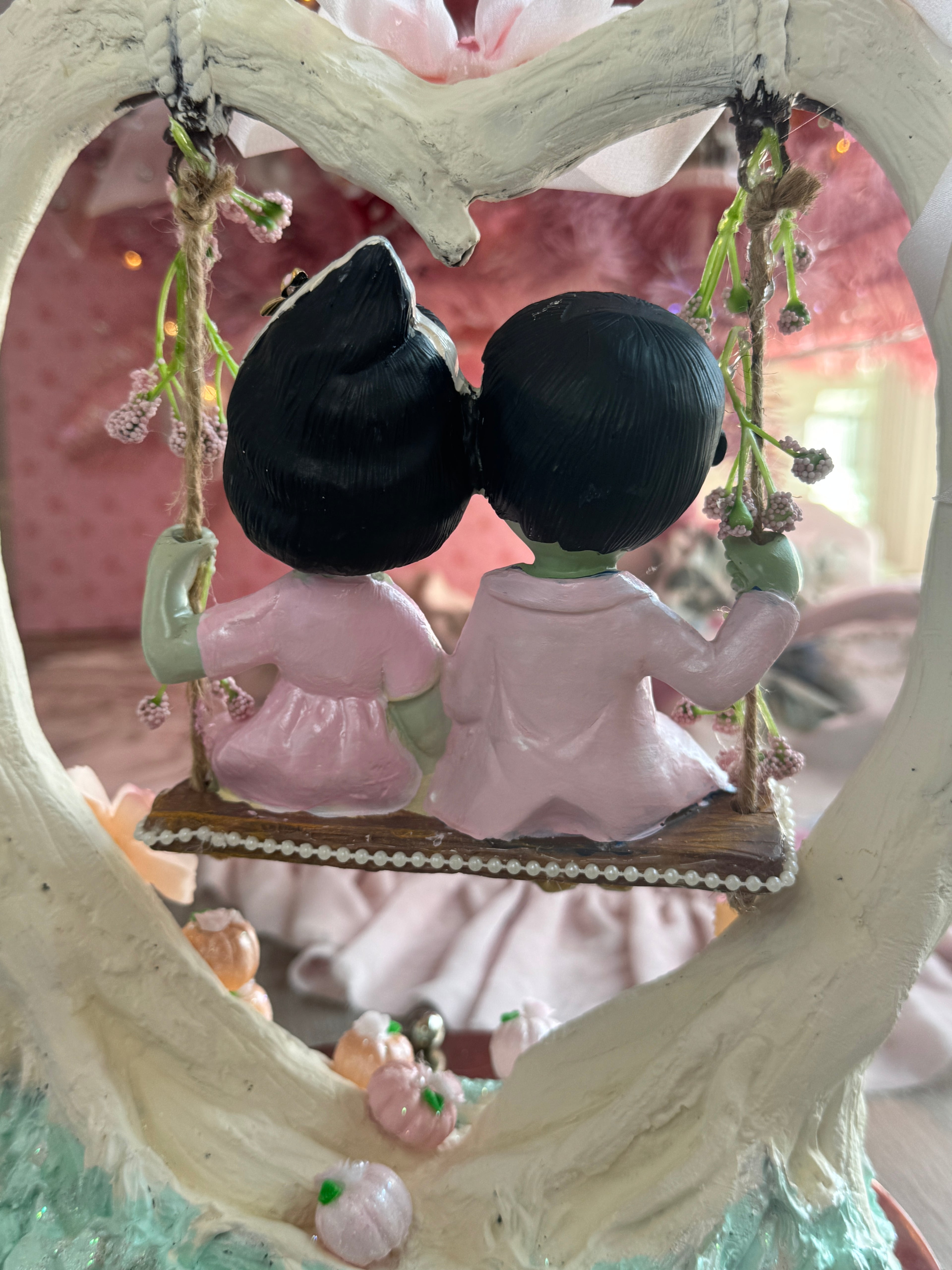 Frankenstein and Bride on swing