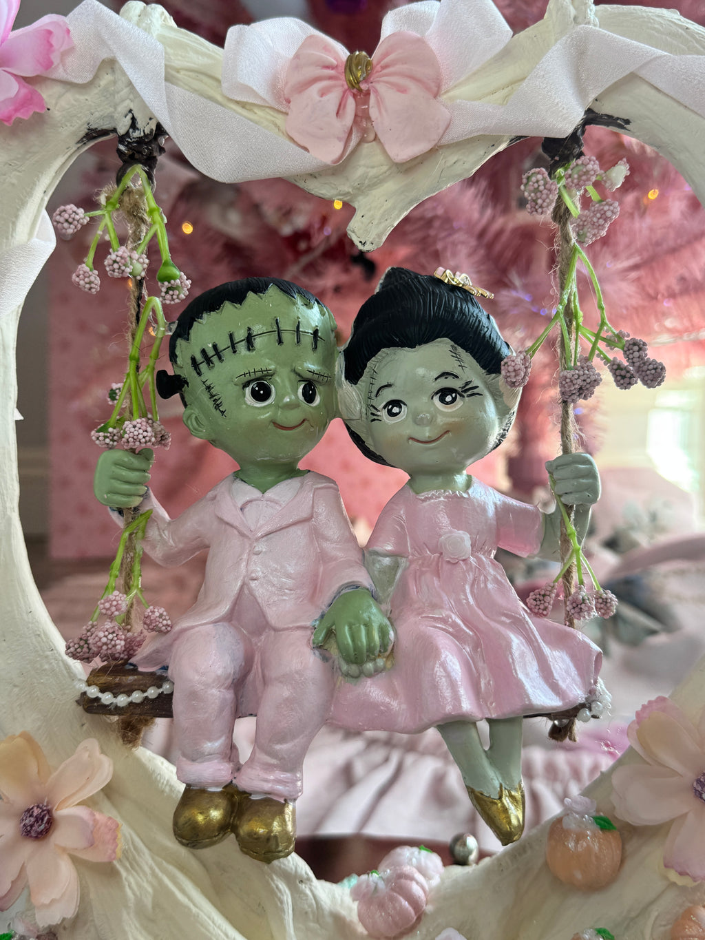 Frankenstein and Bride on swing