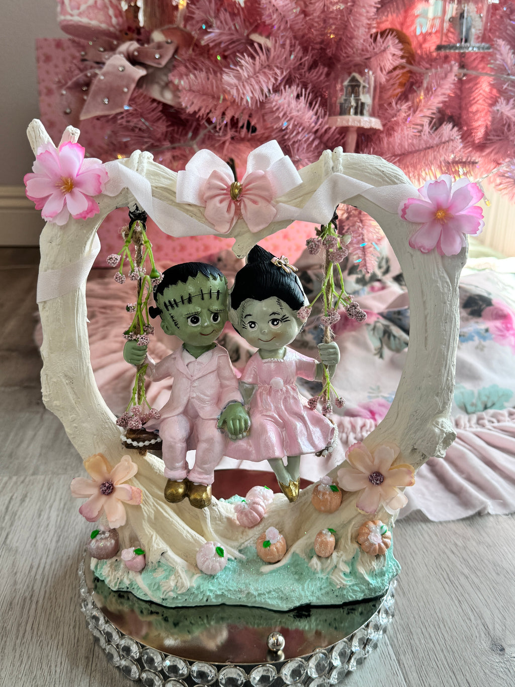 Frankenstein and Bride on swing