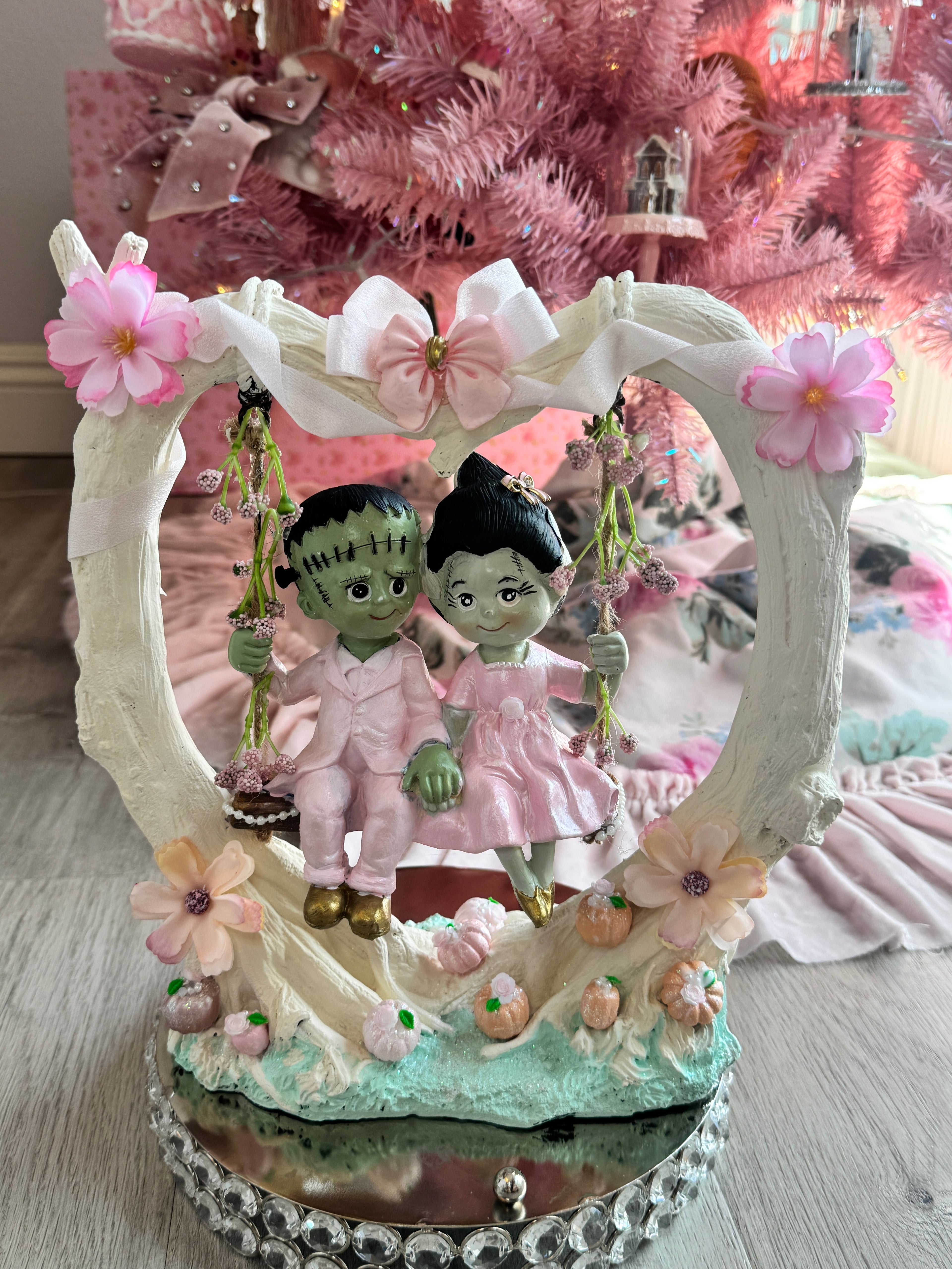 Frankenstein and Bride on swing