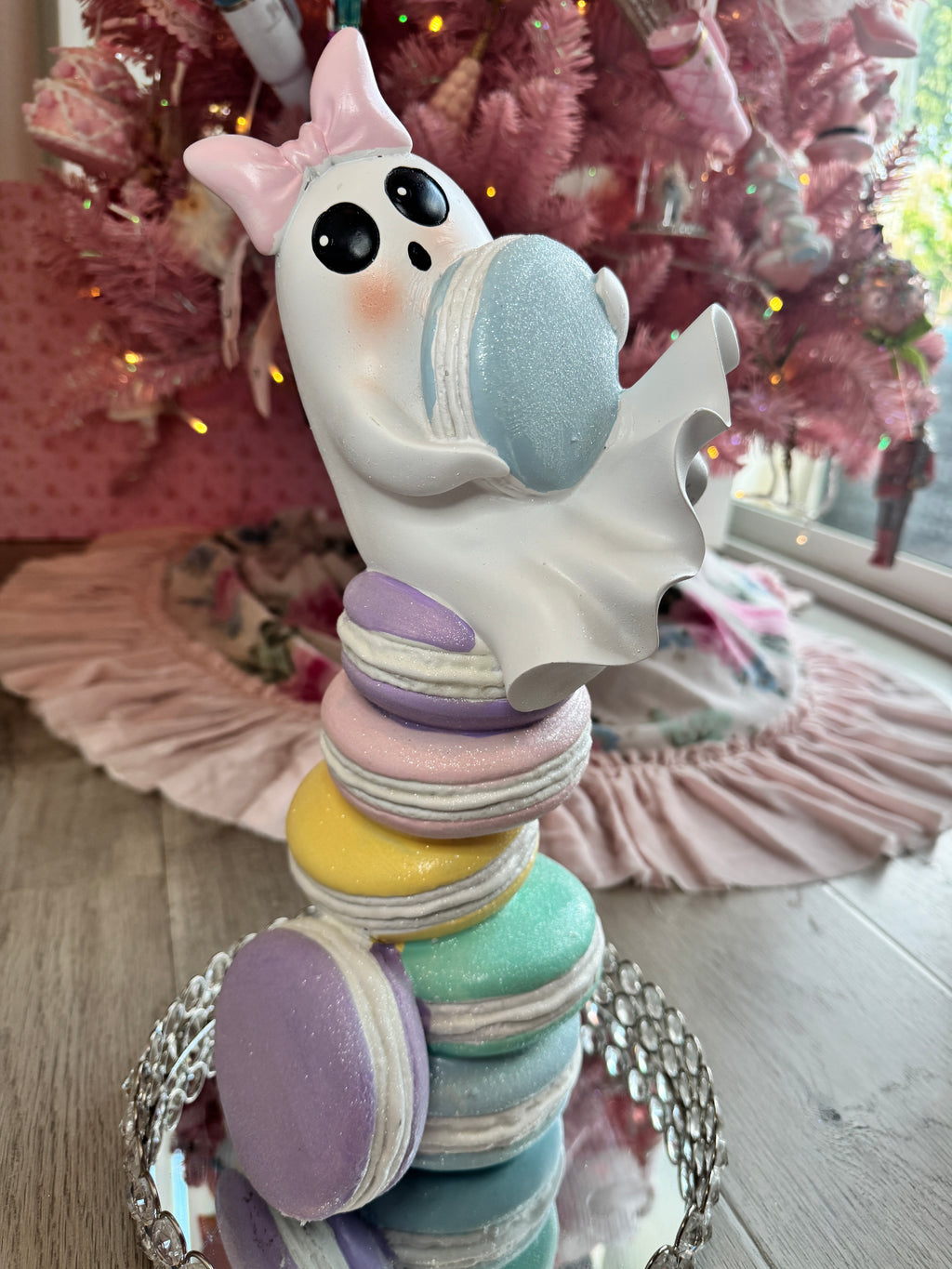Halloween ghost on multicolor macarons