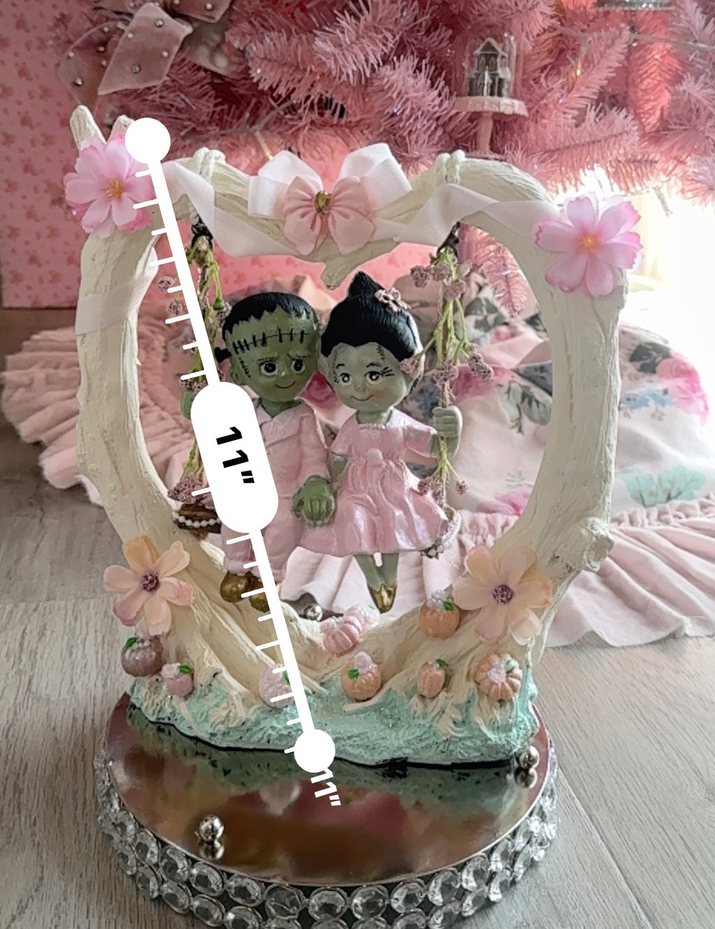 Frankenstein and Bride on swing