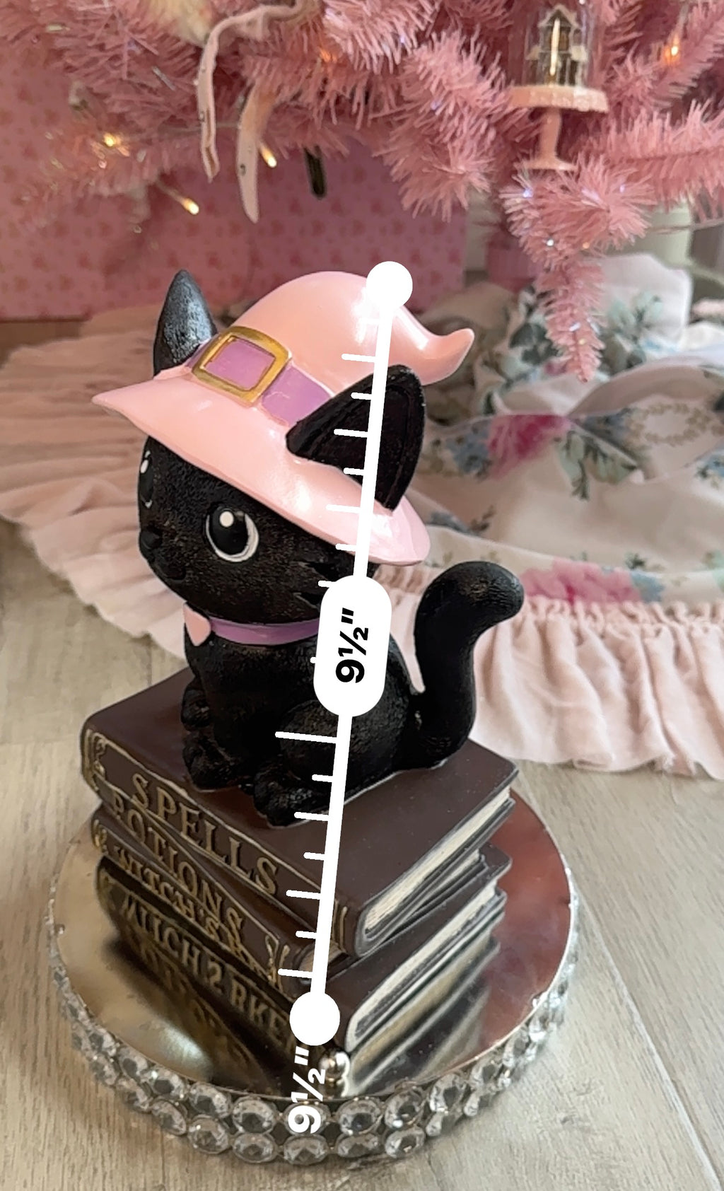 Halloween pink kitty on spell book