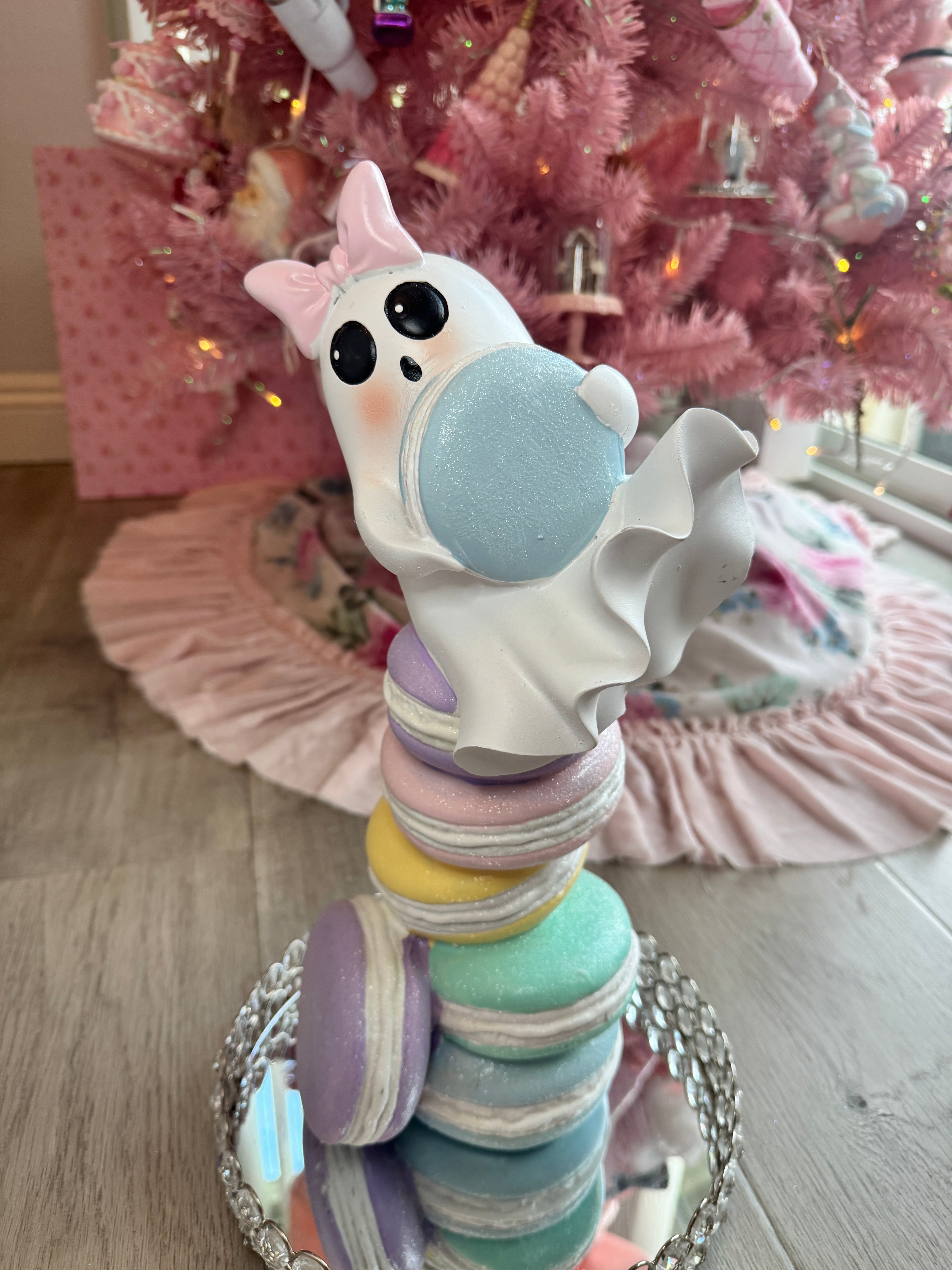 Halloween ghost on multicolor macarons