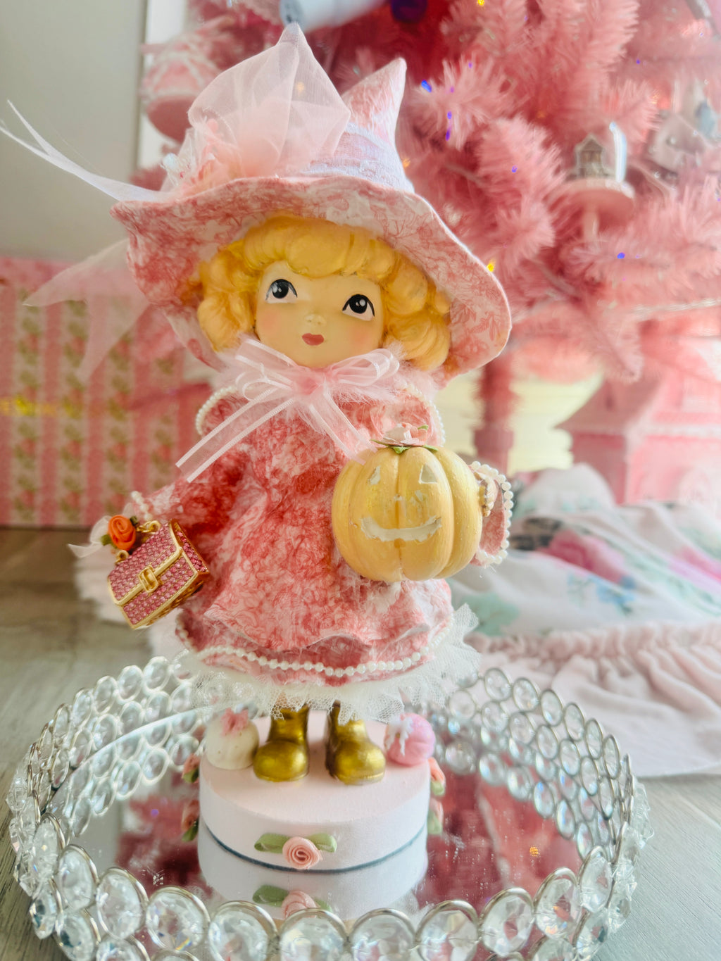Pink Girl holding Purse and Pumpkin Figurine