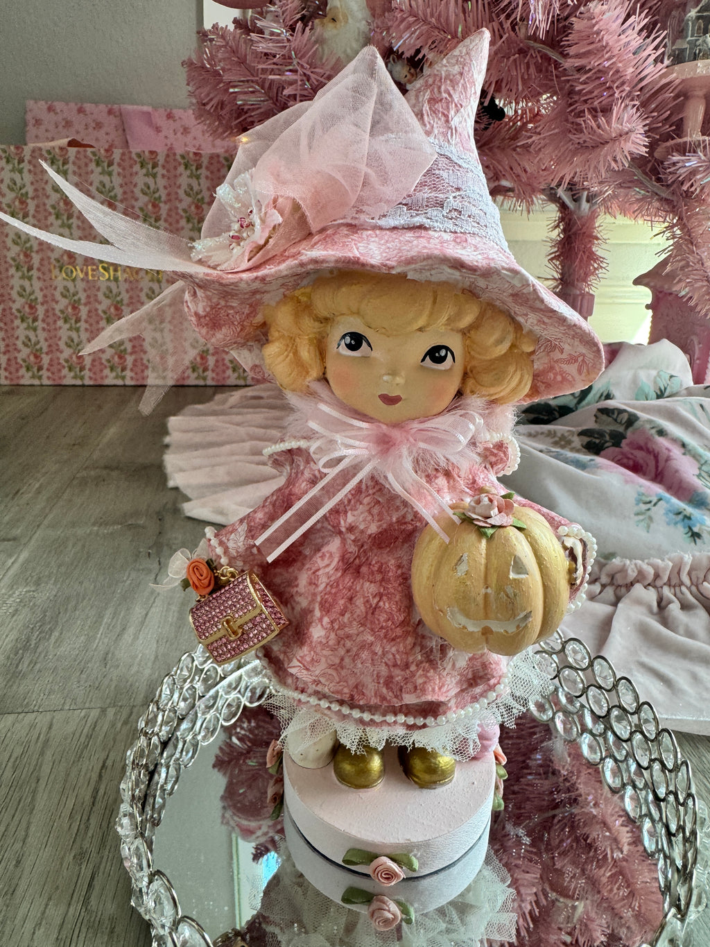 Pink Girl holding Purse and Pumpkin Figurine