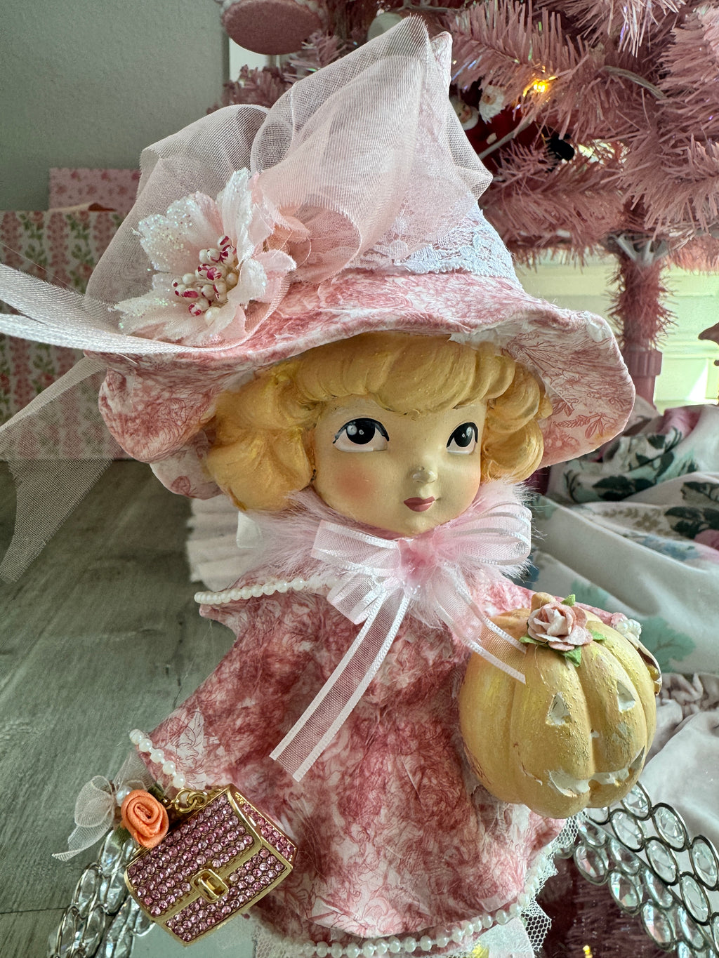 Pink Girl holding Purse and Pumpkin Figurine