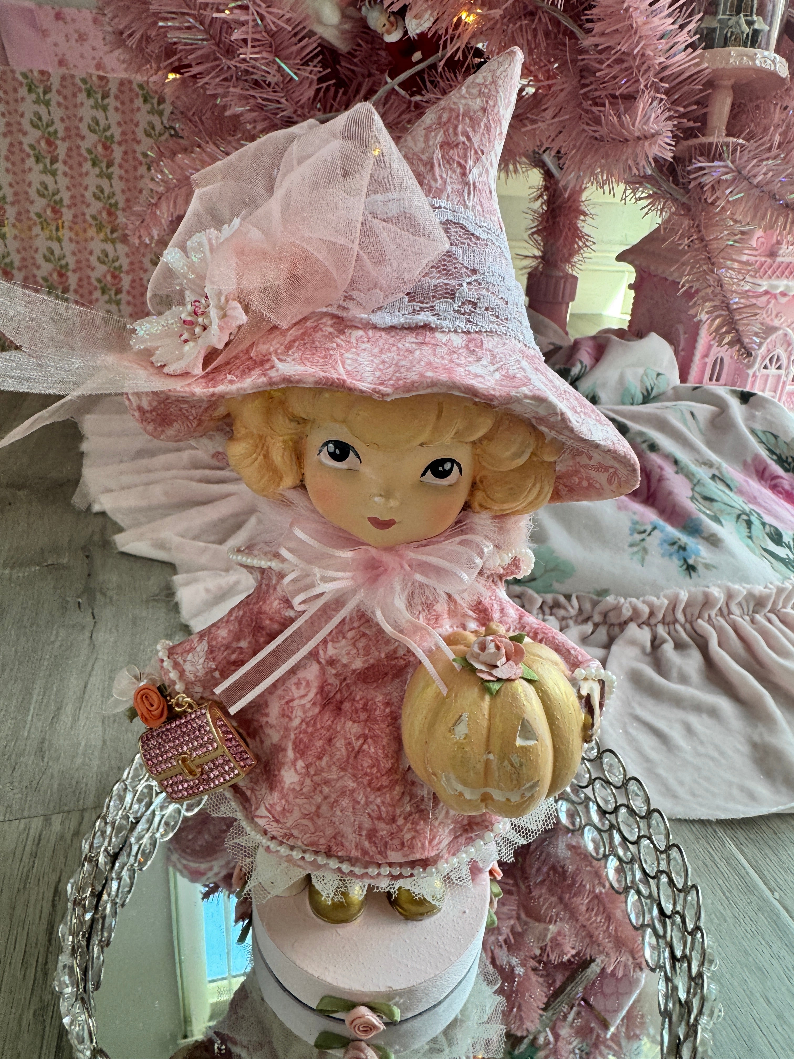 Pink Girl holding Purse and Pumpkin Figurine