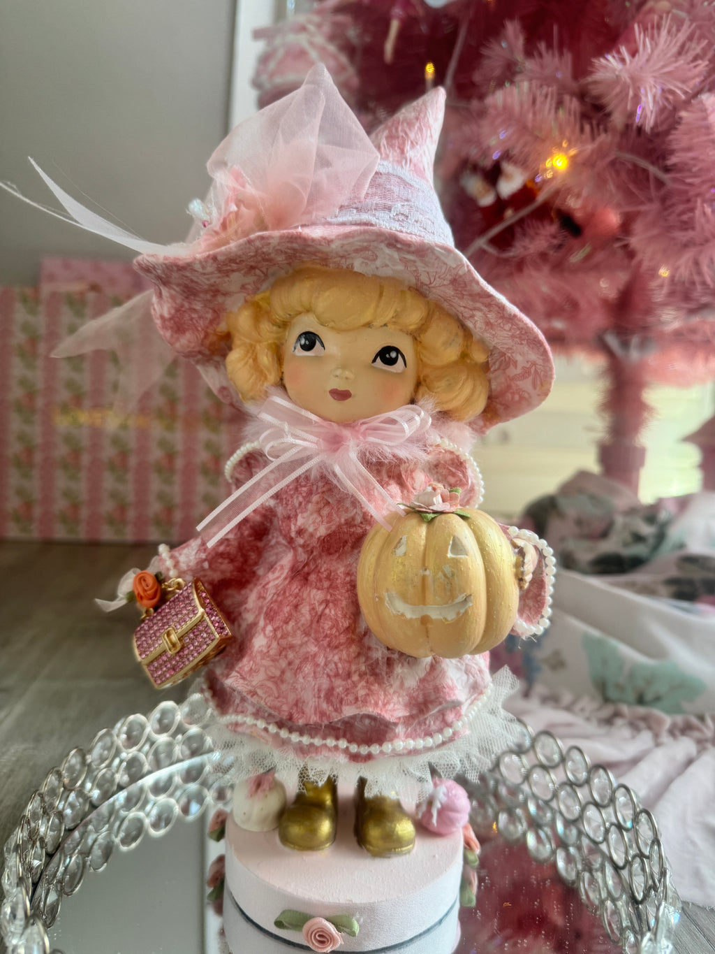Pink Girl holding Purse and Pumpkin Figurine