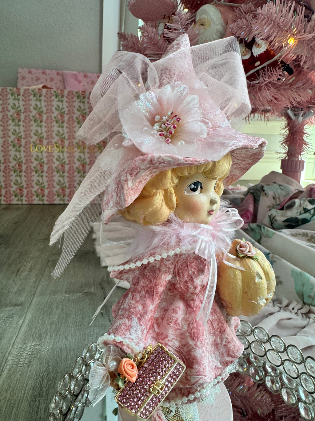 Pink Girl holding Purse and Pumpkin Figurine