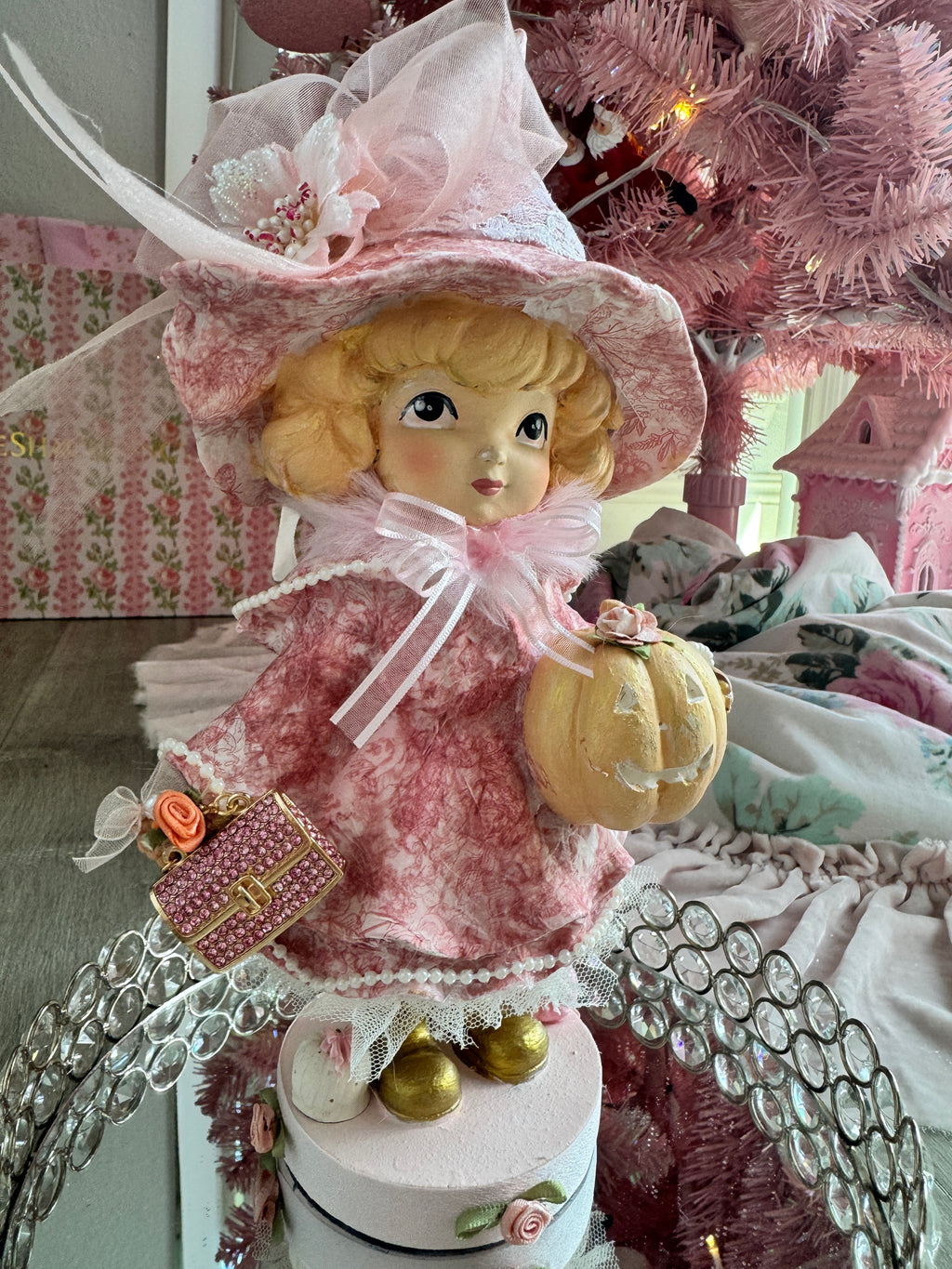 Pink Girl holding Purse and Pumpkin Figurine